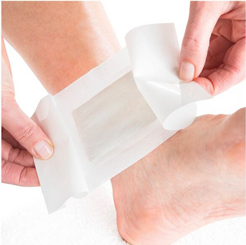 Peel the protective backing and firmly apply 1 TransDren patch to the center sole of each foot right before falling asleep.
